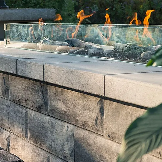 Stone seat wall with a linear fire feature