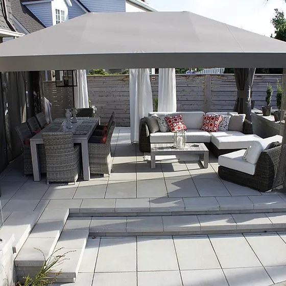 Patio with a gazebo and glass railing